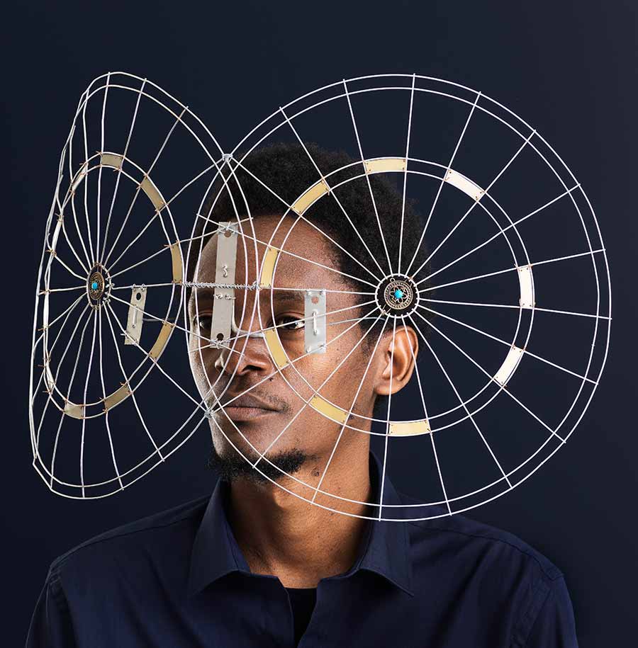 Cyrus Kabiru, Kubwa Macho Nne - American Darts, ed.5/5 + 2AP, 2015.Pigment Ink on HP Premium Satin Photographic Paper, 150 x 150 cm. Cyrus Kabiru, Kubwa Macho Nne - American Darts, ed.5/5 + 2AP, 2015.Pigment Ink on HP Premium Satin Photographic Paper, 150 x 150 cm.