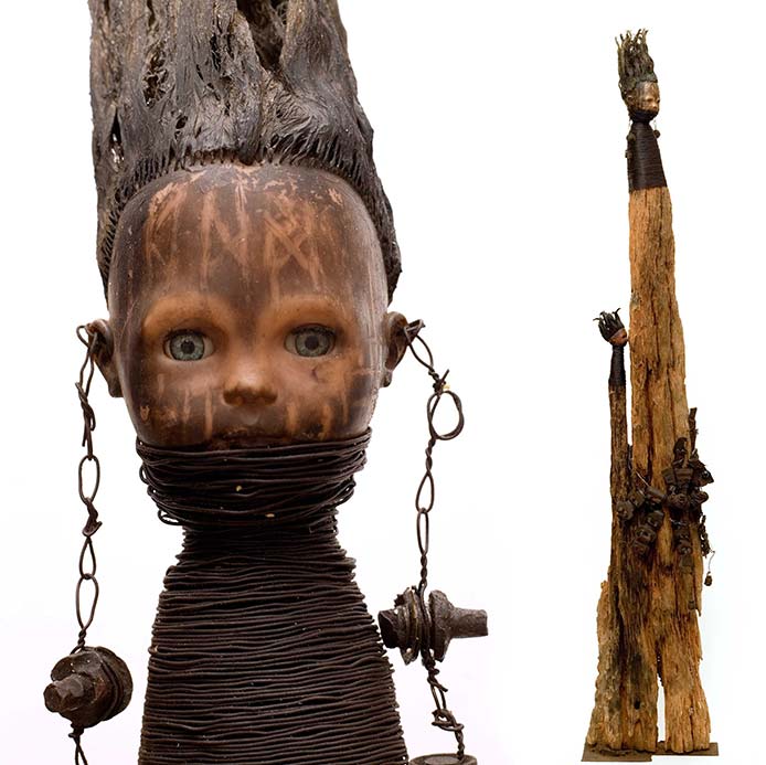 Gérard Quenum, Femmes Peul (Triptych), 2007. Wood, doll, wire, hardware, 203 x 37 x 16 cm. 