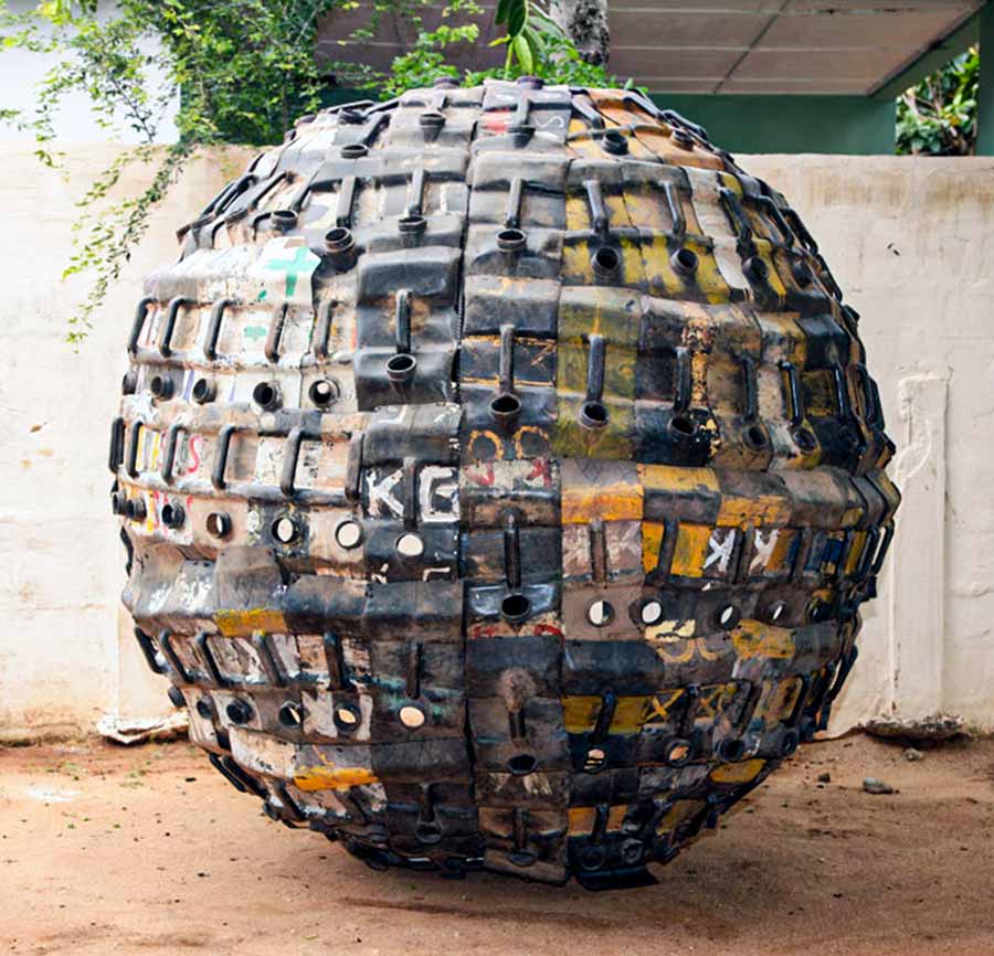 Romuald Hazoumè, Exit Ball, 2009. Plastic and metal, 210 x 210 cm. Romuald Hazoumè, Exit Ball, 2009. Plastic and metal, 210 x 210 cm.