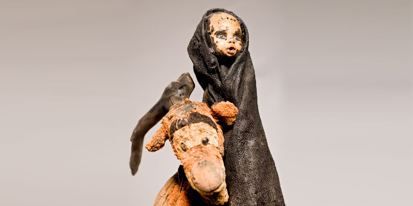 Gérard Quenum, La Vendangeuse, 2012. Wood, metal, cloth and plastic doll, 203 x 63 x 30 cm.