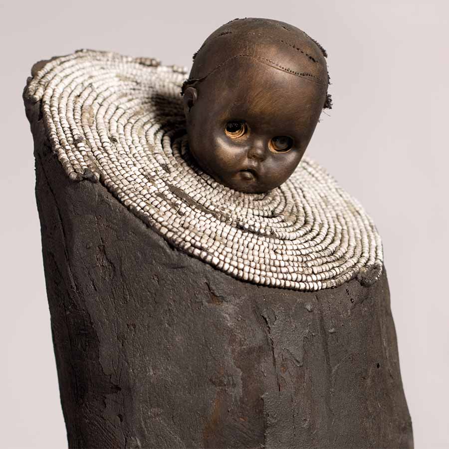 <strong>Gérard Quenum</strong>, <em>La bonne bergère (The Good Shepherdess)</em>, 2012.
Wood, metal, beads, rope and plastic doll, 168 x 43 x 43 cm.