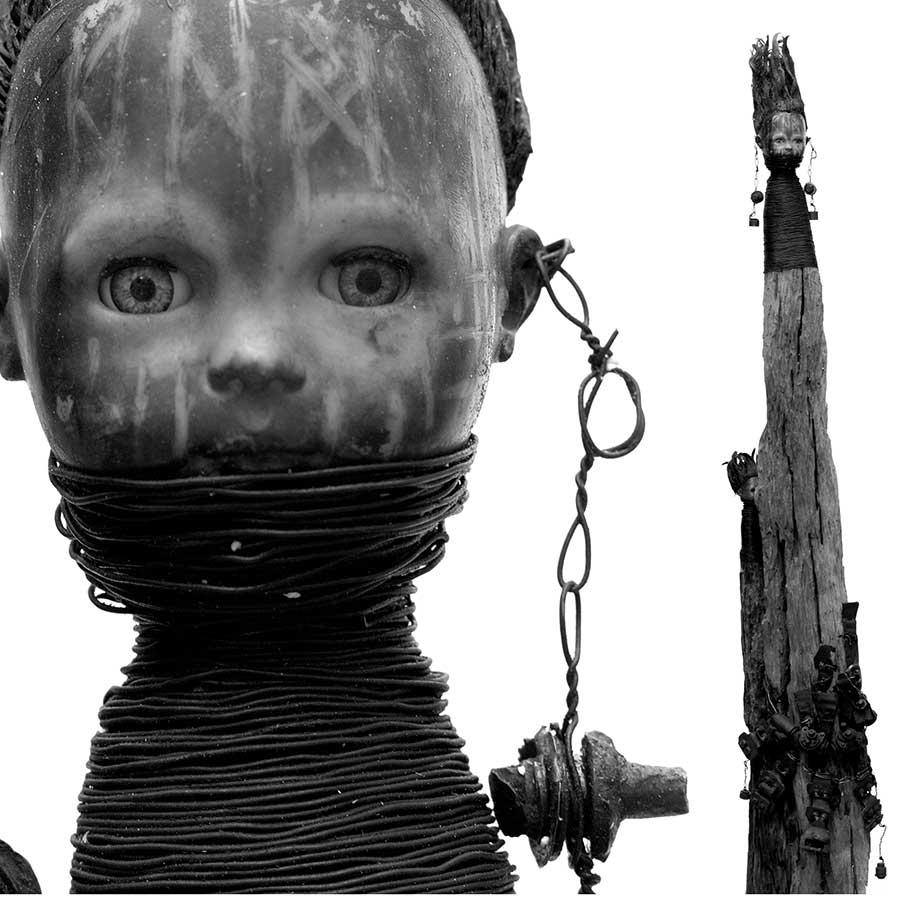 <strong>Gérard Quenum</strong>, <em>Femmes Peul</em>, 2007. Wood, doll, wire, hardware, 203 x 37 x 16 cm.