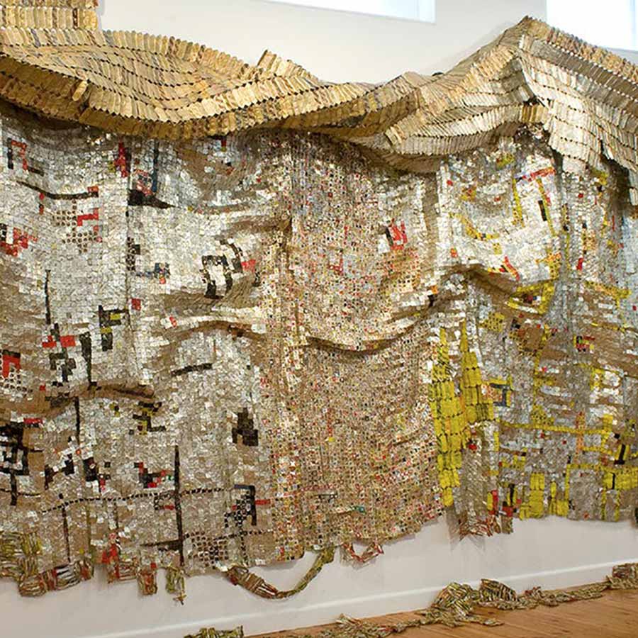 <strong>El Anatsui</strong>, <em>Skylines</em>, 2008. Aluminium and copper wire, 300 x 825 cm.