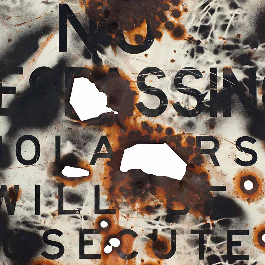<strong>Williams S. Burroughs</strong>, <em>Untitled</em>, ca. 1988.
Spray paint and gunshots on metal sign, 36 x 50.5 cm.