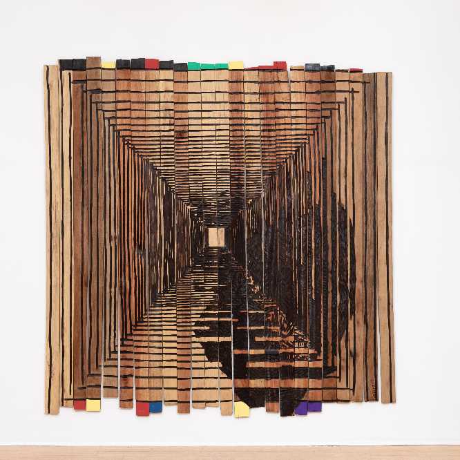 El Anatsui, Passage of Time, 2023. Tropical hardwood and tempera, 244 x 244 cm (96 x 96 in).