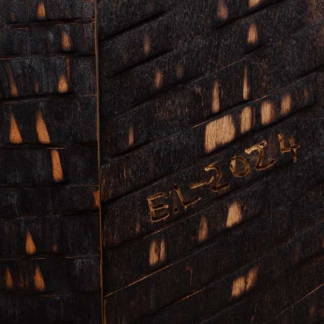 El Anastui, Moon Fragments (detail), 2024. Tropical hardwood and tempera, 148 x 335 cm.